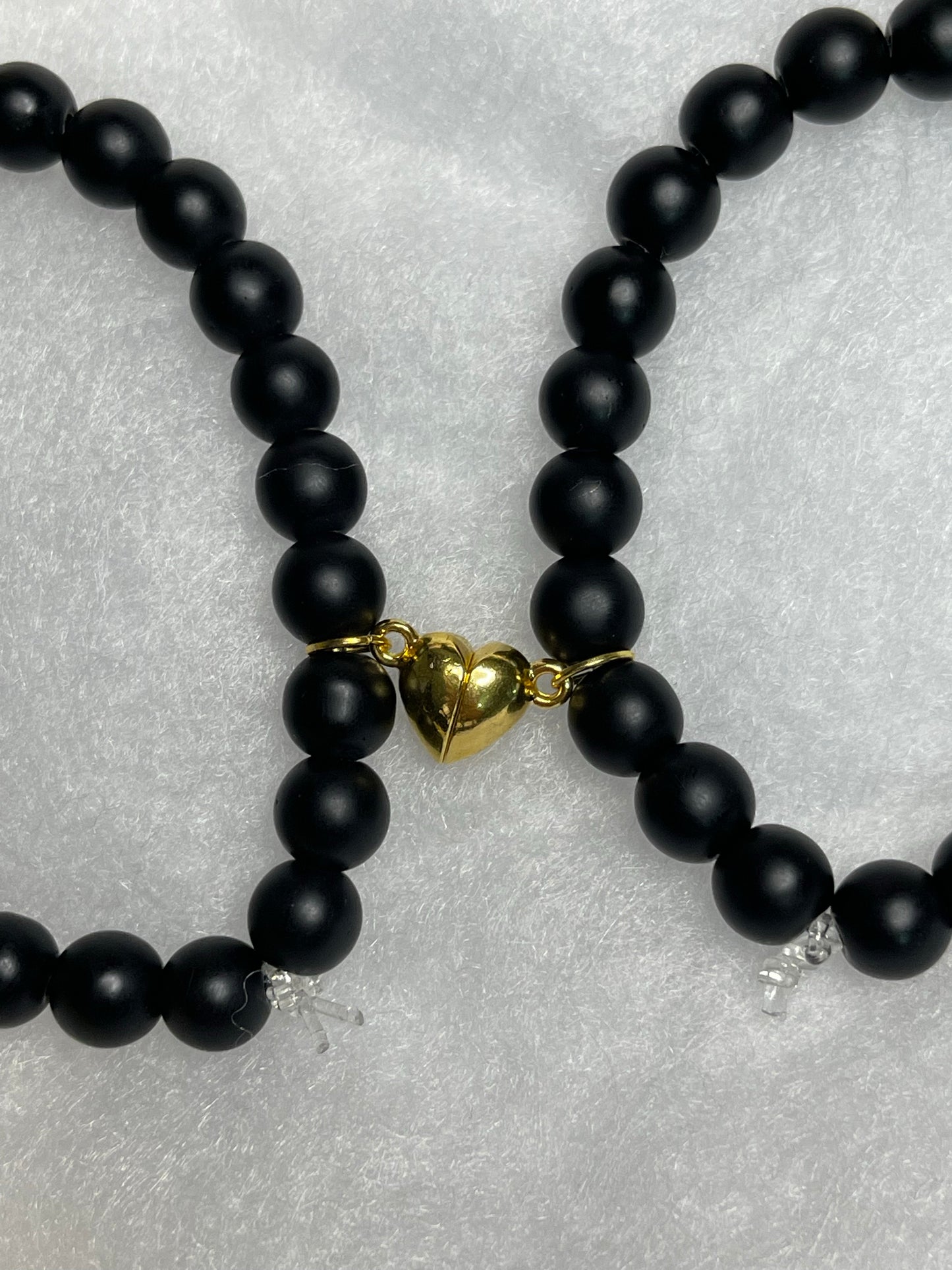 Gold Evil eye matching black bracelets with magnetic heart